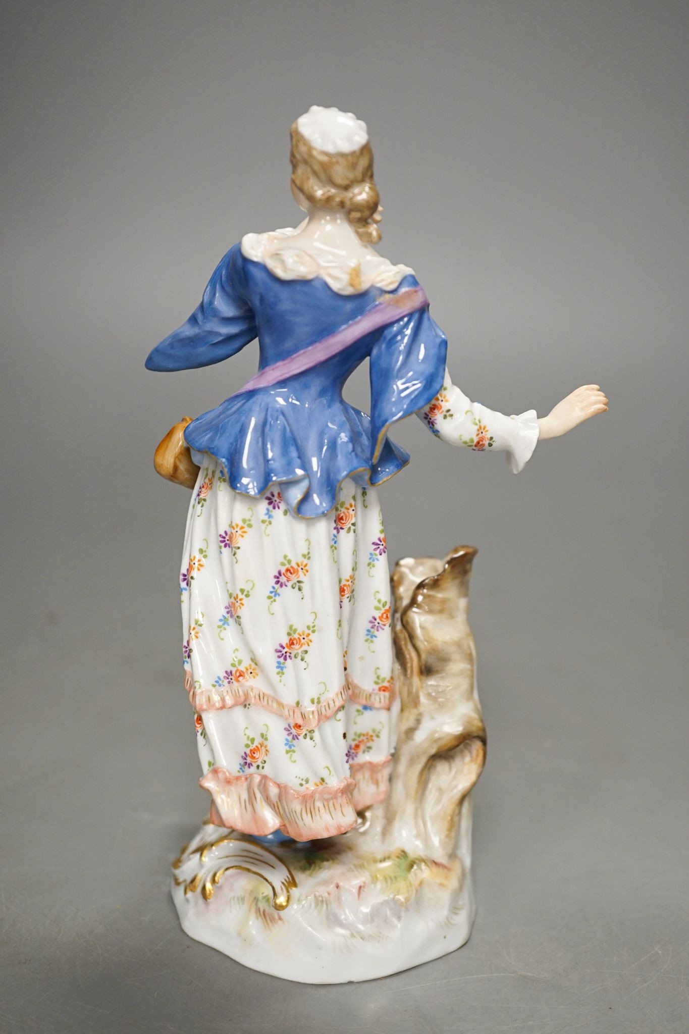 A Meissen figure of a lady, incised model 1984. 18cm tall